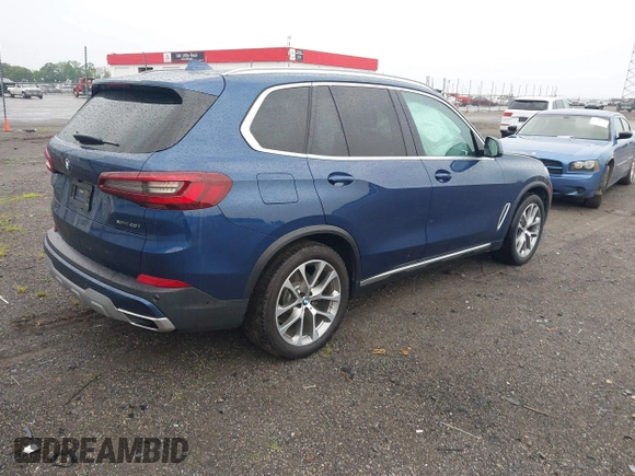 2020 BMW X5 xDrive40i z VIN 5UXCR6C08L9C37774, wystawiony jako IAAI lot #42202870 z przebiegiem 23 918 mil mil oraz . Historia ofert i sprzedaży dostępna na DreamBid. Obrazek 4.