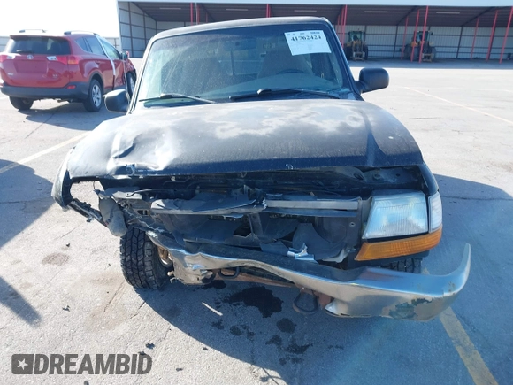 1999 Ford Ranger XL with VIN 1FTZR15V1XPA38040, listed as a IAAI auction lot 41762424 with 208,473 mi miles. Bid and sale history available at carsss.com. Image 12.