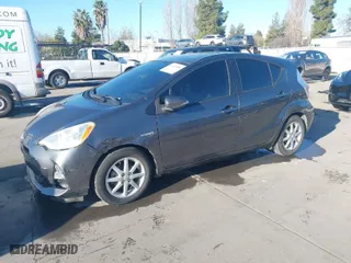 2012 Toyota Prius c One with VIN JTDKDTB34C1031059, listed as a IAAI auction lot 41624950 with 117,490 mi miles. Bid and sale history available at carsss.com. Image 2.