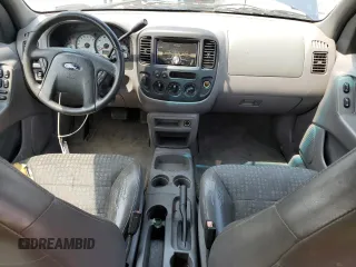 2001 Ford Escape XLS с VIN 1FMYU02161KA58399, выставлен на аукционе Copart как лот 58973115 с пробегом 221 560 миль миль и Списание • Salvage title. История ставок и продаж доступна на DreamBid. Изображение 8.