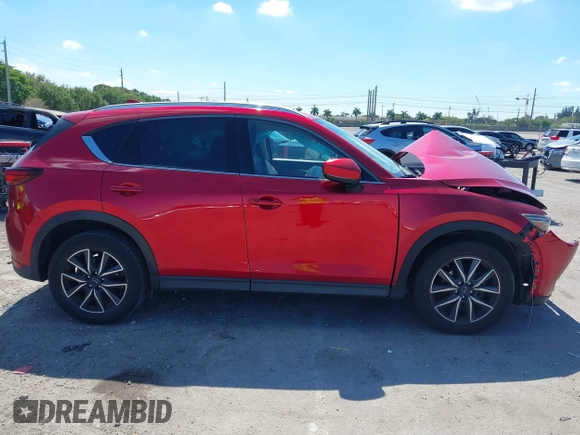 2018 Mazda CX-5 Grand Touring with VIN JM3KFADM0J0377091, listed as a IAAI auction lot 41677544 with 91,758 mi miles. Bid and sale history available at carsss.com. Image 14.