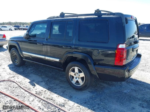 2010 Jeep Commander Sport with VIN 1J4RG4GKXAC156977, listed as a IAAI auction lot 41813409 with NaN miles. Bid and sale history available at carsss.com. Image 3.