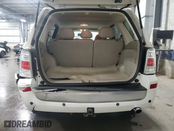 2009 Mercury Mariner Premier with VIN 4M2CU97G09KJ06145, listed as a Copart auction lot 47119525 with 158,430 mi miles and Salvage title. Bid and sale history available at DreamBid. Image 6.