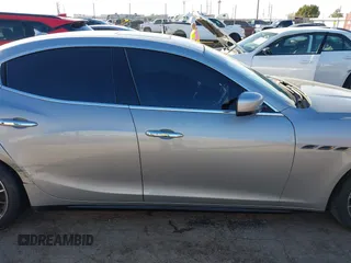 2015 Maserati Ghibli z VIN ZAM57XSA7F1135961, wystawiony jako IAAI lot #40831583 z przebiegiem 89 671 mil mil oraz . Historia ofert i sprzedaży dostępna na DreamBid. Obrazek 13.