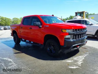 2021 Chevrolet Silverado 1500 Custom Trail Boss with VIN 1GCPYCEH5MZ173277, listed as a IAAI auction lot 41595244 with 100,611 mi miles. Bid and sale history available at carsss.com. Image 1.