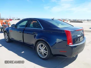 2008 Cadillac CTS AWD z VIN 1G6DH577980158801, wystawiony jako IAAI lot #41805061 z przebiegiem 99 579 mil mil oraz . Historia ofert i sprzedaży dostępna na DreamBid. Obrazek 3.