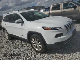 2016 Jeep Cherokee Limited with VIN 1C4PJMDS3GW310598, listed as a Copart auction lot 57182065 with 123,602 mi miles and Salvage title. Bid and sale history available at DreamBid. Image 4.