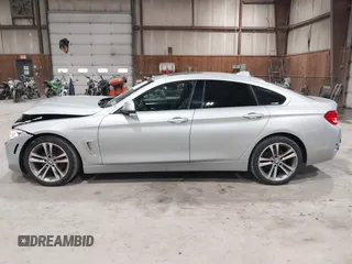2016 BMW 4 Series 428i xDrive with VIN WBA4C9C5XGG138843, listed as a IAAI auction lot 41747358 with 63,804 mi miles and . Bid and sale history available at DreamBid. Image 14.