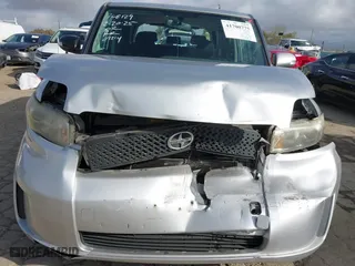 2009 Scion xB with VIN JTLKE50E691089958, listed as a IAAI auction lot 41700775 with 129,396 mi miles. Bid and sale history available at carsss.com. Image 6.