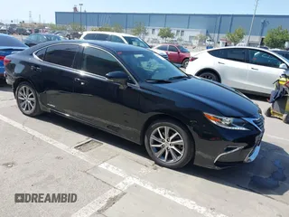 2016 Lexus ES 300h with VIN JTHBW1GGXG2101611, listed as a IAAI auction lot 41999411 with 139,204 mi miles and . Bid and sale history available at DreamBid. Image 1.