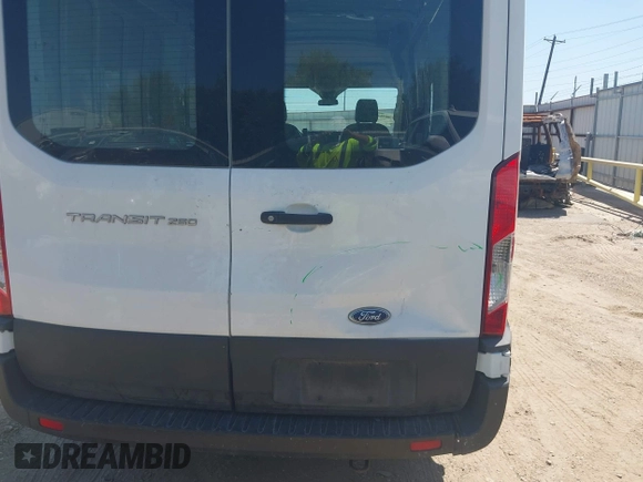 2021 Ford Transit Cargo with VIN 1FTBR1C8XMKA64837, listed as a IAAI auction lot 42008582 with 74,562 mi miles and . Bid and sale history available at DreamBid. Image 17.