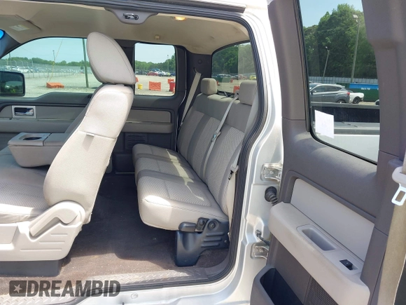 2009 Ford F-150 STX with VIN 1FTRX12849KC94659, listed as a IAAI auction lot 42275301 with 159,357 mi miles and . Bid and sale history available at DreamBid. Image 8.