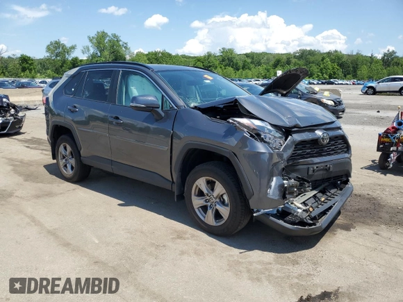 2023 Toyota RAV4 XLE with VIN 2T3P1RFV0PC331350, listed as a Copart auction lot 61234355 with 27,962 mi miles and Salvage title. Bid and sale history available at DreamBid. Image 4.