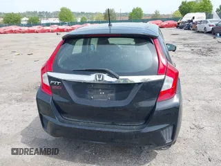 2015 Honda Fit EX-L with VIN 3HGGK5H80FM701502, listed as a IAAI auction lot 42130607 with Not Provided miles and . Bid and sale history available at DreamBid. Image 16.