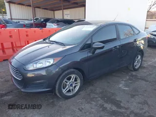 2018 Ford Fiesta SE with VIN 3FADP4BJ4JM111942, listed as a IAAI auction lot 41422060 with 107,041 mi miles and . Bid and sale history available at DreamBid. Image 2.