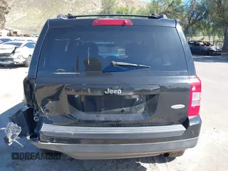 2013 Jeep Patriot Latitude with VIN 1C4NJPFA5DD230031, listed as a IAAI auction lot 41641768 with 153,910 mi miles. Bid and sale history available at carsss.com. Image 16.