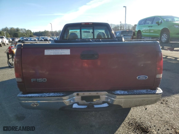 1997 Ford F-150 Standard with VIN 1FTDF1721VNA54544, listed as a Copart auction lot 85661394 with 221,536 mi miles and Salvage Title. Bid and sale history available at carsss.com. Image 11.