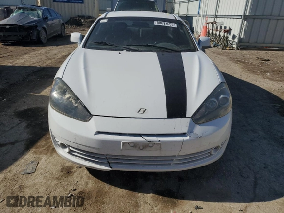 2008 Hyundai Tiburon GT z VIN KMHHN66F98U286353, wystawiony jako Copart lot #88682555 z przebiegiem 174 136 mil mil oraz Szkoda całkowita • Salvage title. Historia ofert i sprzedaży dostępna na DreamBid. Obrazek 5.