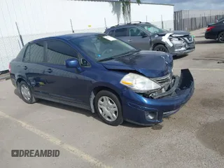 2010 Nissan Versa 1.8 S with VIN 3N1BC1APXAL459173, listed as a IAAI auction lot 41923738 with 192,563 mi miles. Bid and sale history available at carsss.com. Image 1.