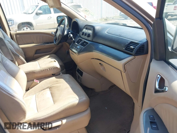 2006 Honda Odyssey EX-L with VIN 5FNRL38666B410188, listed as a IAAI auction lot 42004957 with 156,584 mi miles. Bid and sale history available at carsss.com. Image 5.