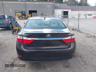 2014 Lexus ES 300h with VIN JTHBW1GG7E2040277, listed as a IAAI auction lot 41867667 with 104,623 mi miles and . Bid and sale history available at DreamBid. Image 16.