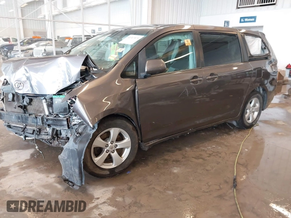 2012 Toyota Sienna with VIN 5TDKA3DC0CS012095, listed as a IAAI auction lot 41317071 with Not Provided miles and . Bid and sale history available at DreamBid. Image 2.