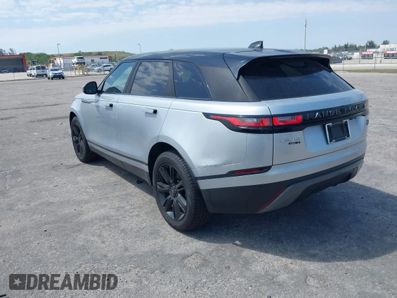 2020 Land Rover Range Rover Velar S z VIN SALYB2EXXLA255258, wystawiony jako IAAI lot #41823002 z przebiegiem 66 527 mil mil oraz . Historia ofert i sprzedaży dostępna na DreamBid. Obrazek 3.