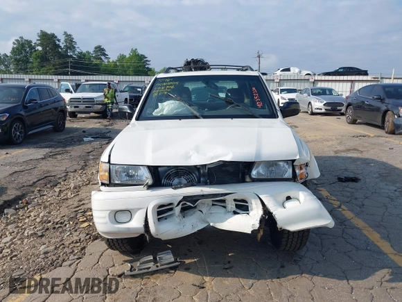 2002 Isuzu Rodeo S with VIN 4S2CK58W524321108, listed as a IAAI auction lot 42352330 with 270,614 mi miles and . Bid and sale history available at DreamBid. Image 13.