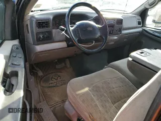 2000 Ford F-250 with VIN 1FTNF21S9YEA14056, listed as a Copart auction lot 80151994 with 165,477 mi miles and Salvage title. Bid and sale history available at DreamBid. Image 8.