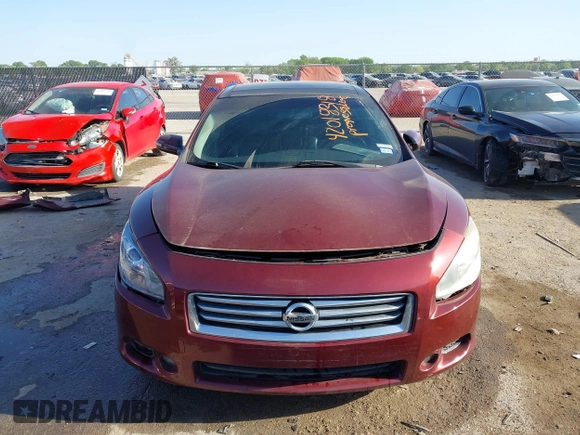 2013 Nissan Maxima S with VIN 1N4AA5AP5DC847780, listed as a IAAI auction lot 42018318 with 128,839 mi miles and . Bid and sale history available at DreamBid. Image 12.