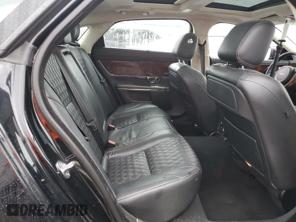 2016 Jaguar XJ Portfolio with VIN SAJWJ2GD8G8W02010, listed as a Copart auction lot 79011404 with Not Provided miles and Salvage Title. Bid and sale history available at DreamBid. Image 10.