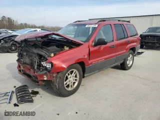 2004 Jeep Grand Cherokee Laredo with VIN 1J4GX48S14C302550, listed as a Copart auction lot 48757145 with 182,614 mi miles and Salvage Title. Bid and sale history available at carsss.com. Image 1.