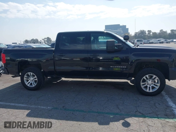 2018 Chevrolet Silverado 1500 Work Truck with VIN 3GCUKNEC6JG463656, listed as a IAAI auction lot 41621657 with 151,580 mi miles. Bid and sale history available at carsss.com. Image 13.