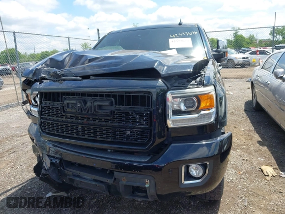 2015 GMC Sierra 2500HD Denali with VIN 1GT120E82FF574358, listed as a IAAI auction lot 42377676 with 86,097 mi miles and . Bid and sale history available at DreamBid. Image 12.