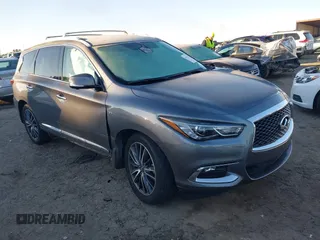2020 Infiniti QX60 LUXE with VIN 5N1DL0MMXLC506990, listed as a IAAI auction lot 41307122 with 83,657 mi miles. Bid and sale history available at carsss.com. Image 1.