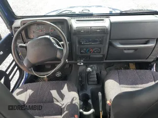 2001 Jeep Wrangler SE with VIN 1J4FA29P51P354795, listed as a Copart auction lot 73874834 with 0 mi miles and Salvage Title. Bid and sale history available at carsss.com. Image 8.