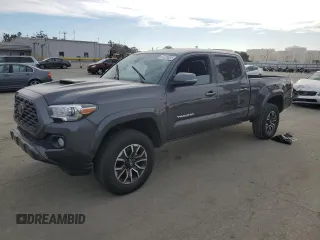 2022 Toyota Tacoma SR5 with VIN 3TMDZ5BN2NM128354, listed as a Copart auction lot 47223085 with 36,162 mi miles and Salvage title. Bid and sale history available at DreamBid. Image 1.