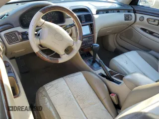 2001 Toyota Solara SE z VIN 2T1FF28P61C474810, wystawiony jako Copart lot #78028704 z przebiegiem 117 214 mil mil oraz Czysty tytuł • Clean title. Historia ofert i sprzedaży dostępna na DreamBid. Obrazek 8.