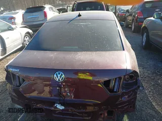 2014 Volkswagen Passat S w/Nav with VIN 1VWAP7A30EC009933, listed as a IAAI auction lot 41690840 with 202,200 mi miles. Bid and sale history available at carsss.com. Image 17.