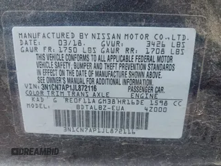 2018 Nissan Versa SV z VIN 3N1CN7AP1JL872116, wystawiony jako IAAI lot #42149712 z przebiegiem 131 990 mil mil oraz . Historia ofert i sprzedaży dostępna na DreamBid. Obrazek 9.