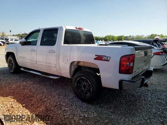 2010 Chevrolet Silverado 1500 LT with VIN 3GCRCSE03AG165766, listed as a Copart auction lot 52150475 with 132,253 mi miles and Salvage Title. Bid and sale history available at DreamBid. Image 2.