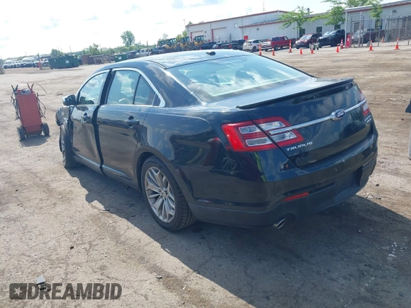 2014 Ford Taurus Limited z VIN 1FAHP2F85EG125118, wystawiony jako IAAI lot #42457437 z przebiegiem 129 406 mil mil oraz . Historia ofert i sprzedaży dostępna na DreamBid. Obrazek 3.