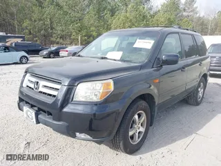 2006 Honda Pilot EX-L with VIN 5FNYF28576B030507, listed as a IAAI auction lot 41720898 with 201,518 mi miles. Bid and sale history available at carsss.com. Image 2.