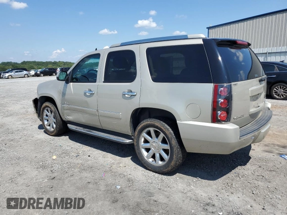 2013 GMC Yukon Denali with VIN 1GKS2EEF2DR276957, listed as a Copart auction lot 66677844 with 159,597 mi miles and Salvage Title. Bid and sale history available at carsss.com. Image 2.