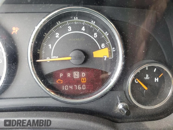 2014 Jeep Compass Latitude with VIN 1C4NJDEB4ED904731, listed as a Copart auction lot 51809165 with 104,760 mi miles and Salvage Title. Bid and sale history available at DreamBid. Image 9.