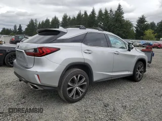 2016 Lexus RX 350 with VIN JTJBZMCA5G2005796, listed as a Copart auction lot 64453905 with 69,784 mi miles and Salvage title. Bid and sale history available at DreamBid. Image 3.