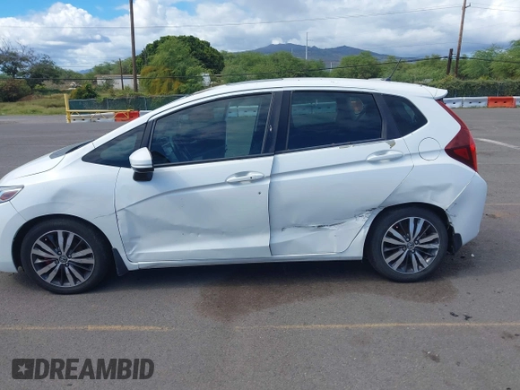 2015 Honda Fit EX-L with VIN 3HGGK5H8XFM753011, listed as a IAAI auction lot 41878734 with 121,514 mi miles and . Bid and sale history available at DreamBid. Image 6.