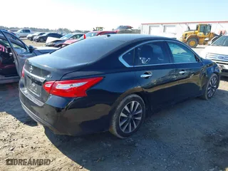 2017 Nissan Altima 2.5 SR with VIN 1N4AL3AP4HC293538, listed as a IAAI auction lot 41492018 with 199,200 mi miles. Bid and sale history available at carsss.com. Image 4.
