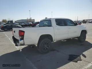 2022 Toyota Tacoma 4WD SR with VIN 3TMCZ5AN6NM462044, listed as a Copart auction lot 47292755 with 64,596 mi miles and Salvage Title. Bid and sale history available at carsss.com. Image 3.