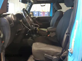 2018 Jeep Wrangler JK Unlimited Sport S with VIN 1C4BJWDG2JL818457, listed as a Copart auction lot 60877004 with 78,503 mi miles and Salvage Title. Bid and sale history available at carsss.com. Image 7.